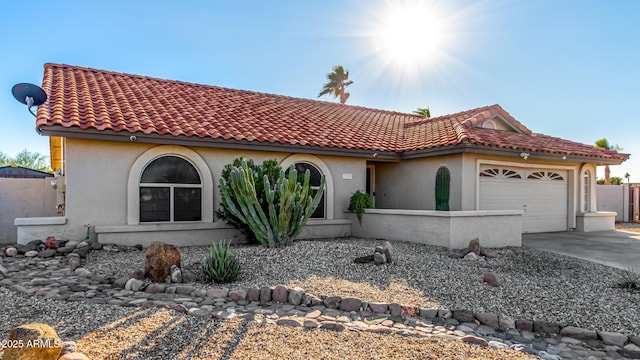 9169 W Ludlow Dr W, Peoria, AZ 85381 - mediterranean / spanish house with stucco siding, a tiled roof, a garage, and concrete driveway