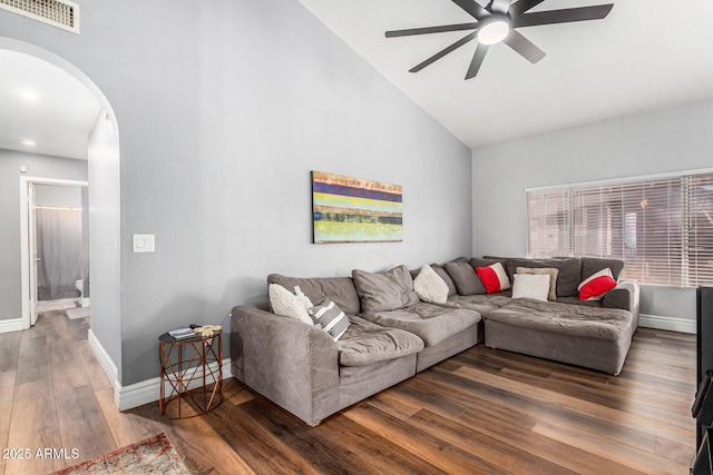9169 W Ludlow Dr W, Peoria, AZ 85381 - living area featuring wood finished floors, baseboards, visible vents, arched walkways, and ceiling fan