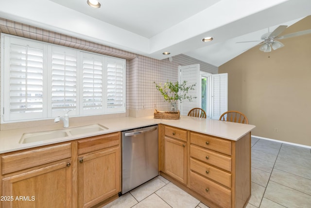 8666 E Cheryl Dr, Scottsdale, AZ 85258 - kitchen featuring a sink, dishwasher, a peninsula, a ceiling fan, and light tile patterned floors