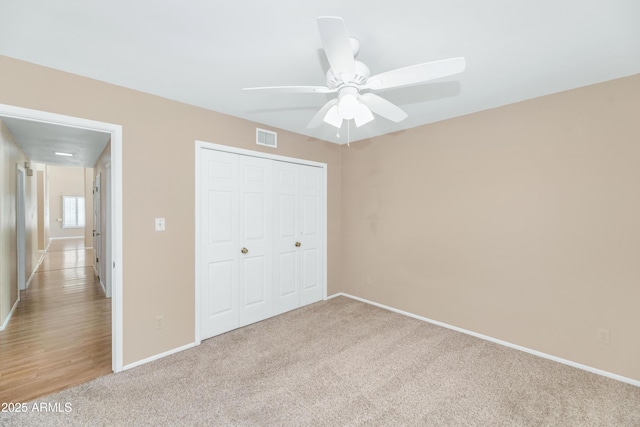 8666 E Cheryl Dr, Scottsdale, AZ 85258 - unfurnished bedroom with baseboards, carpet flooring, and visible vents