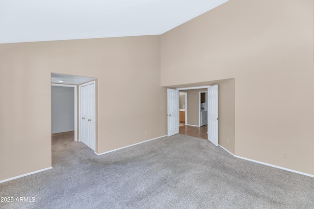 8666 E Cheryl Dr, Scottsdale, AZ 85258 - unfurnished room with carpet flooring, high vaulted ceiling, and baseboards