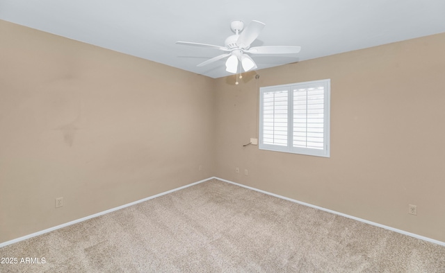 8666 E Cheryl Dr, Scottsdale, AZ 85258 - unfurnished room featuring baseboards, ceiling fan, and carpet flooring