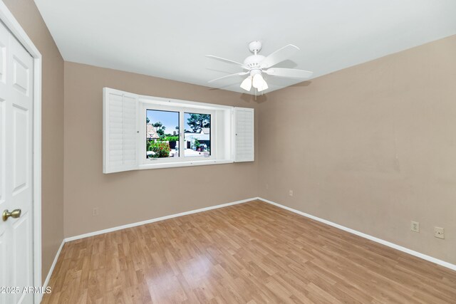 8666 E Cheryl Dr, Scottsdale, AZ 85258 - interior space with baseboards, ceiling fan, and light wood-type flooring
