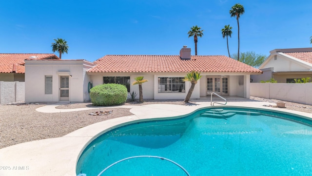 8666 E Cheryl Dr, Scottsdale, AZ 85258 - view of swimming pool with a patio, fence private yard, french doors, and a fenced in pool
