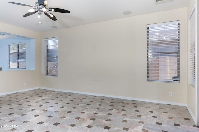 spare room featuring ceiling fan