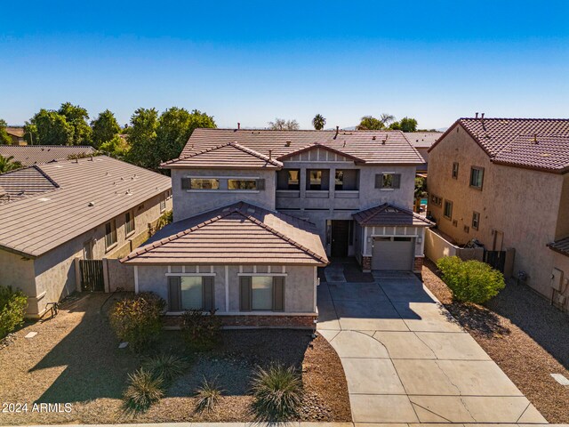 view of front of property with a garage