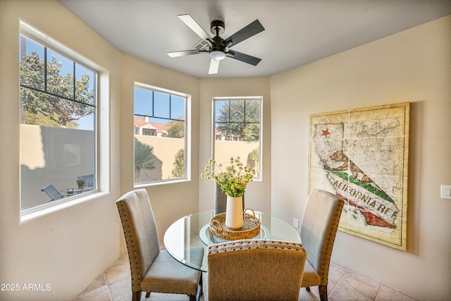 dining area with a ceiling fan