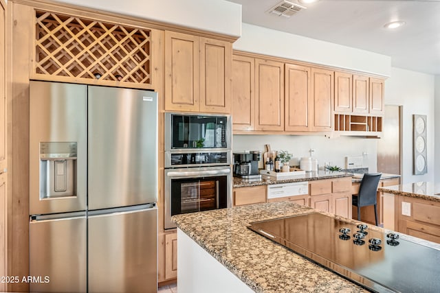 kitchen with light brown cabinets, visible vents, black appliances, and open shelves