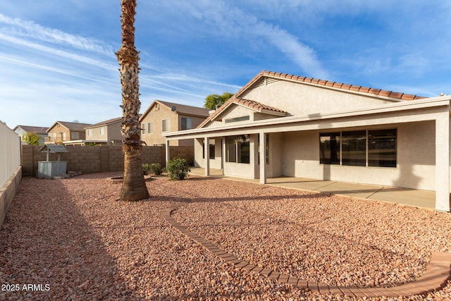 back of house featuring a patio