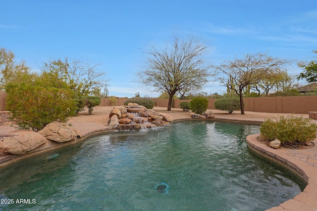 view of pool with a fenced backyard and a fenced in pool