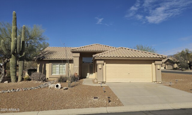 view of front of property with a garage