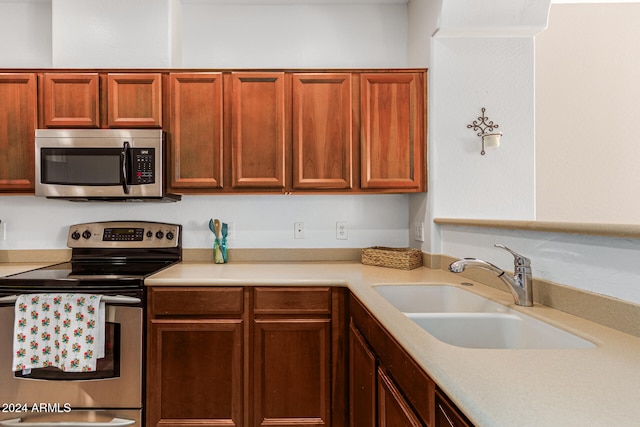 kitchen with stainless steel appliances and sink