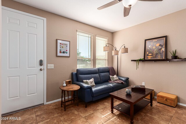 living room featuring ceiling fan