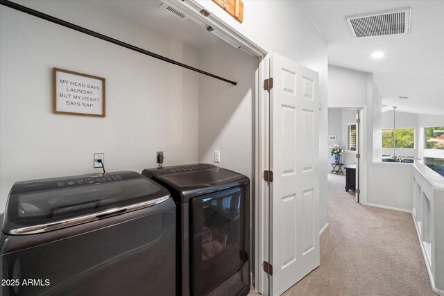 laundry room featuring washer and clothes dryer, light carpet, baseboards, and recessed lighting