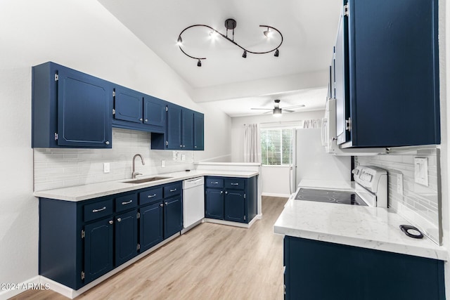 455 S Delaware Dr Unit 120, Apache Junction, AZ 85120 - kitchen featuring white appliances, a sink, blue cabinetry, light wood-type flooring, and backsplash