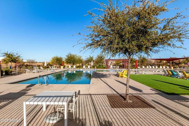 view of swimming pool featuring a pergola and a patio area