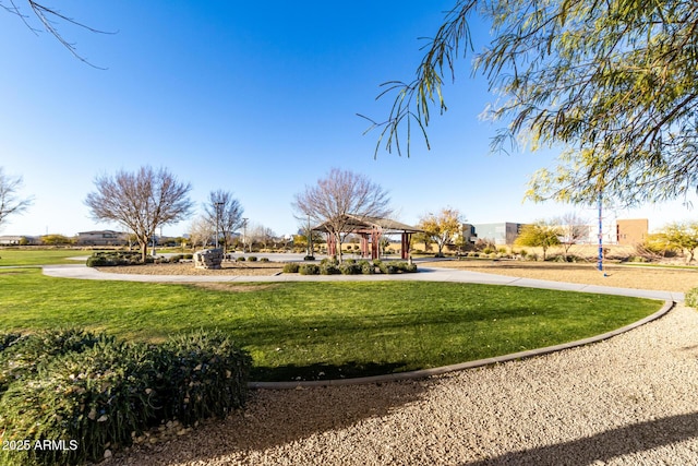 view of community with a gazebo and a lawn