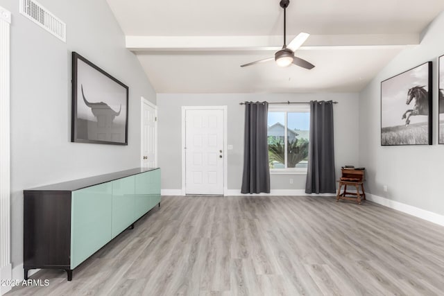 unfurnished living room featuring a ceiling fan, light wood-type flooring, and baseboards