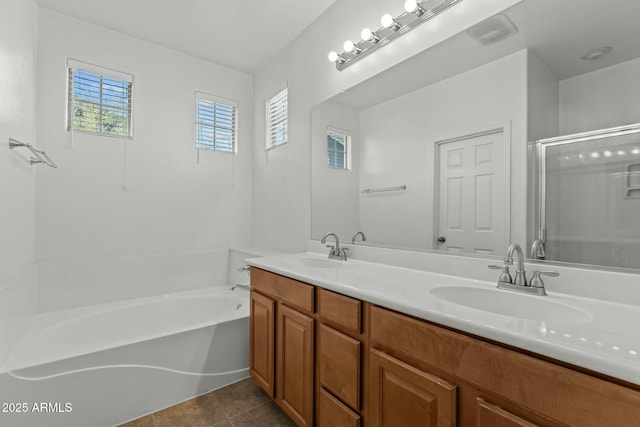 bathroom with independent shower and bath, tile patterned flooring, and vanity