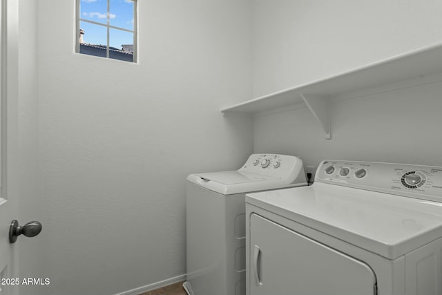 laundry area with washing machine and dryer