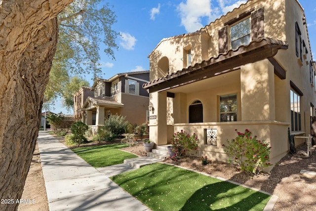 view of front facade with a front lawn