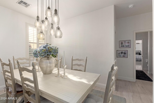 dining room featuring light hardwood / wood-style floors