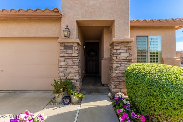 entrance to property with a garage