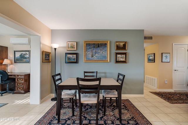 tiled dining space featuring an AC wall unit