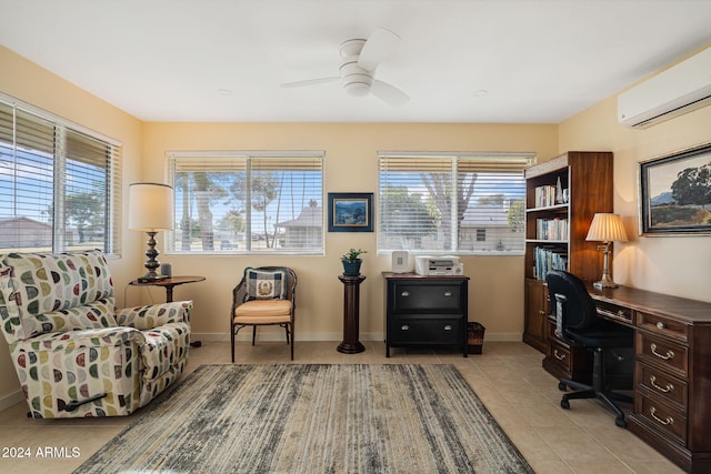 home office with ceiling fan, light tile patterned flooring, a healthy amount of sunlight, and a wall mounted air conditioner