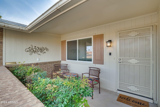 doorway to property featuring a porch