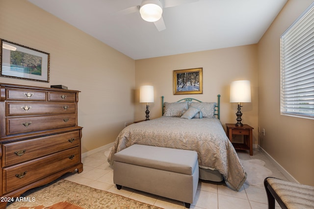 bedroom featuring ceiling fan and light tile patterned floors