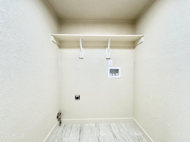 laundry room featuring laundry area, hookup for an electric dryer, washer hookup, and baseboards