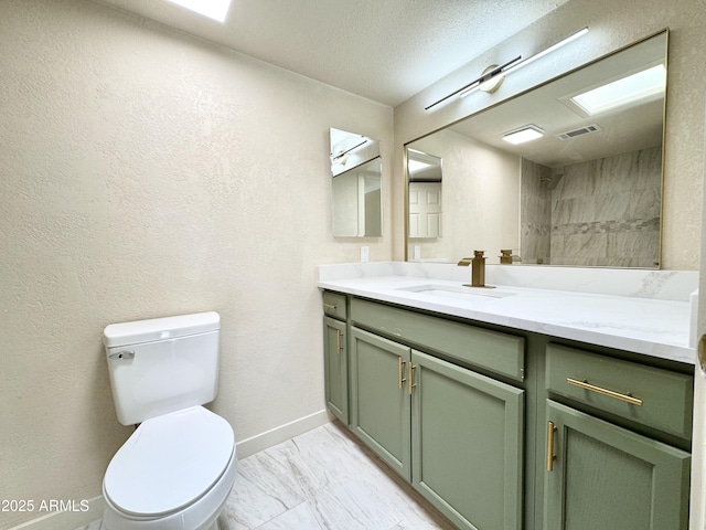 full bath with toilet, visible vents, baseboards, marble finish floor, and vanity