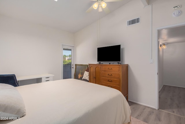 bedroom featuring light wood-type flooring, ceiling fan, and access to exterior