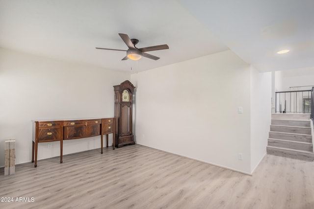 unfurnished room with light hardwood / wood-style flooring and ceiling fan