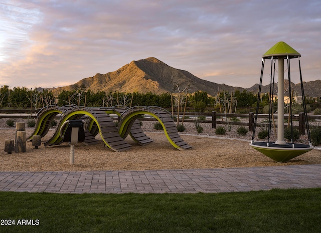 playground at dusk with a mountain view