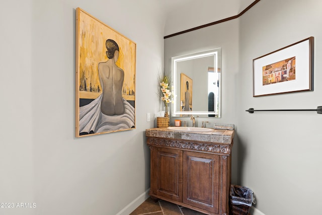 bathroom with vanity and tile patterned floors