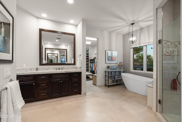 bathroom with vanity and plus walk in shower