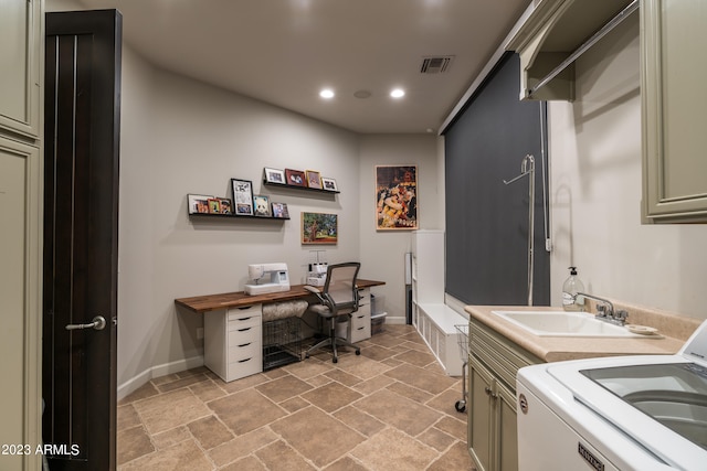 home office with sink and washer / dryer