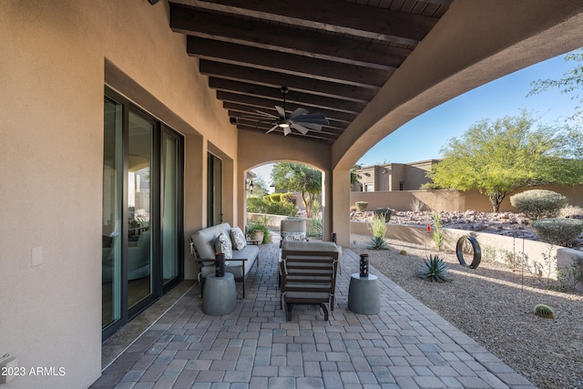 view of patio / terrace with ceiling fan and an outdoor hangout area