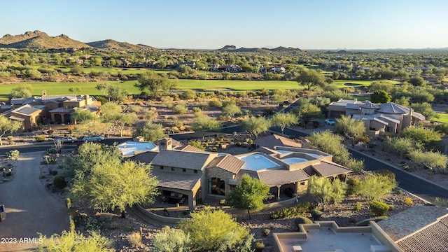 birds eye view of property featuring a mountain view