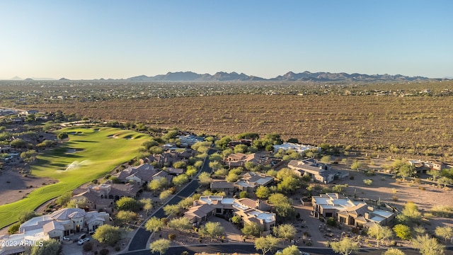 birds eye view of property featuring a mountain view