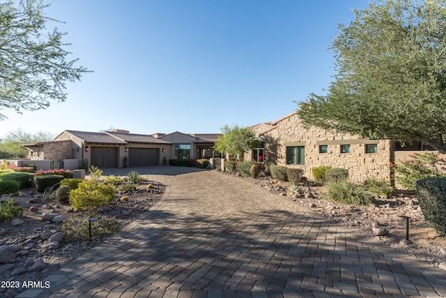 view of front of property with a garage