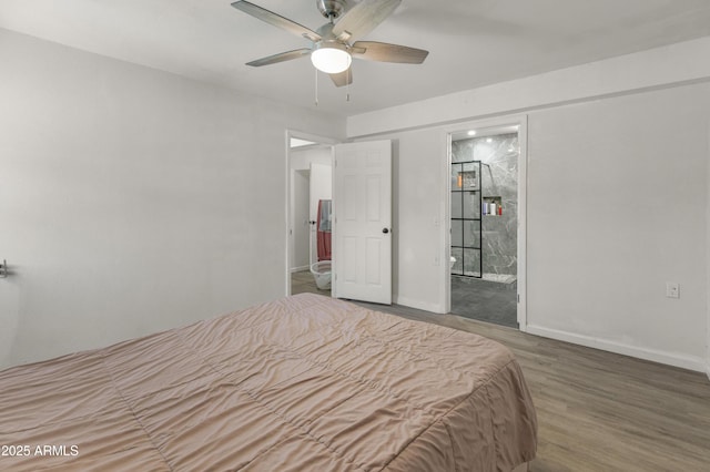 bedroom with a ceiling fan, baseboards, and wood finished floors