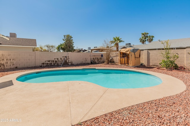 view of pool featuring a patio area, a fenced backyard, and a fenced in pool