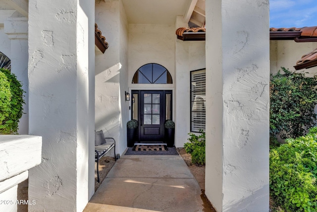 9821 E Windrose Dr, Scottsdale, AZ 85260 - doorway to property with stucco siding
