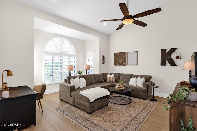 9821 E Windrose Dr, Scottsdale, AZ 85260 - living room featuring ceiling fan, light wood finished floors, and recessed lighting