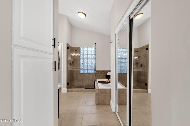 9821 E Windrose Dr, Scottsdale, AZ 85260 - full bath featuring a shower stall, a bath, lofted ceiling, and tile patterned floors