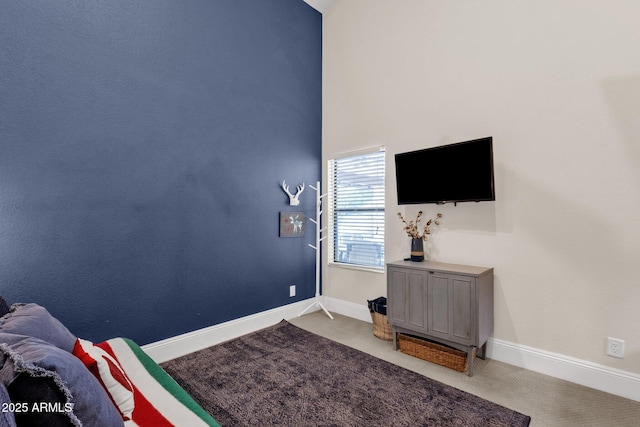 9821 E Windrose Dr, Scottsdale, AZ 85260 - carpeted bedroom featuring baseboards