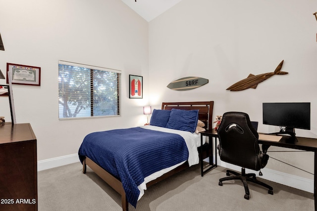 9821 E Windrose Dr, Scottsdale, AZ 85260 - carpeted bedroom with a desk and high vaulted ceiling